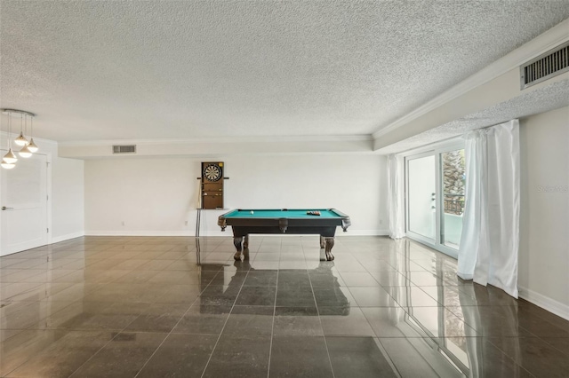 recreation room featuring crown molding, baseboards, visible vents, and a textured ceiling