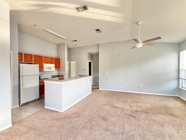 kitchen with white appliances, light carpet, a textured ceiling, and ceiling fan