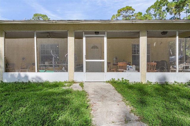 exterior space featuring a sunroom