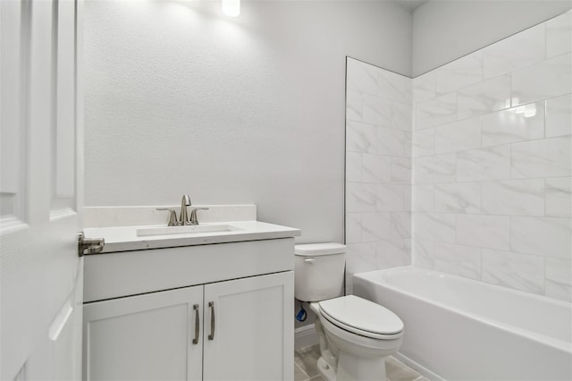 full bathroom featuring vanity, toilet, and tiled shower / bath combo