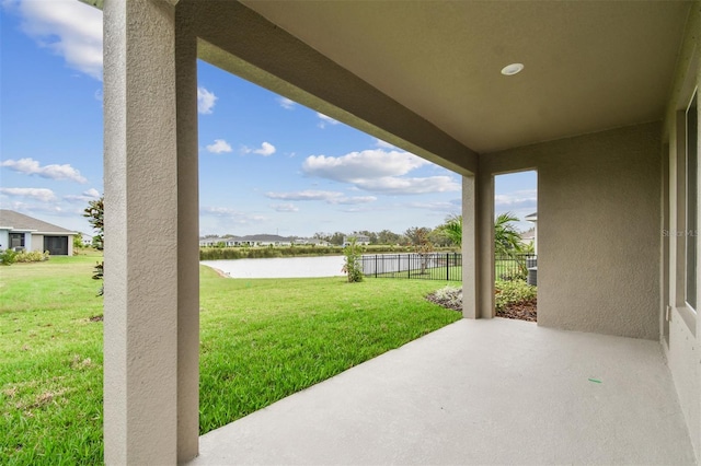 view of patio / terrace featuring a water view