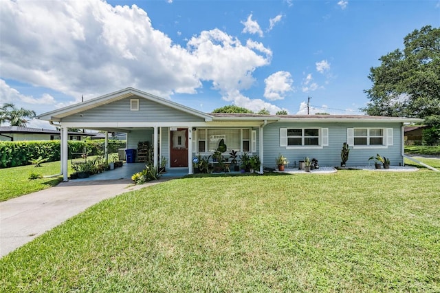 ranch-style house featuring a front yard and a carport