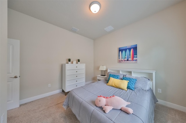 bedroom with light carpet