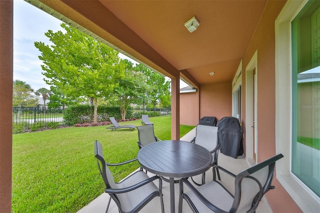 view of patio featuring a grill