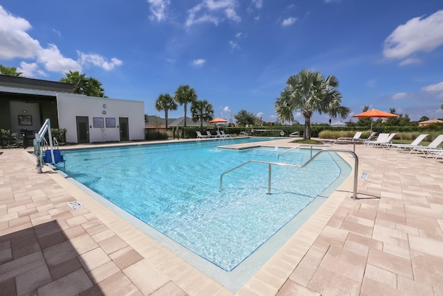 view of swimming pool with a patio area