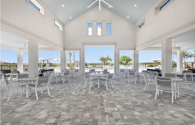 view of patio with a water view