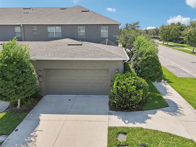 view of property featuring a garage