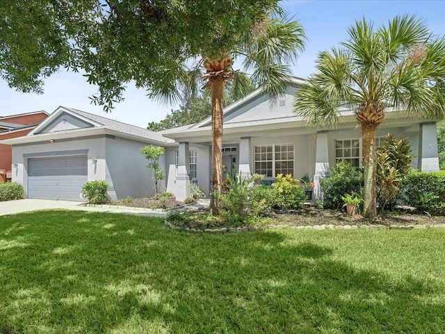 single story home featuring a garage and a front lawn