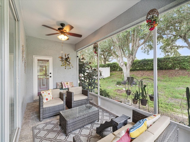 sunroom / solarium with ceiling fan