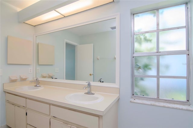 bathroom featuring double sink vanity