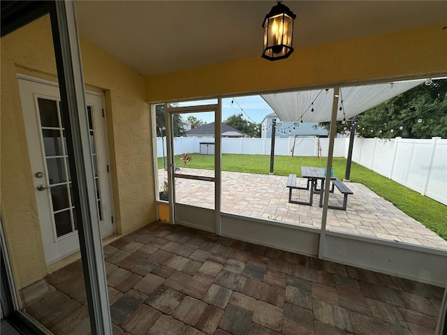 view of unfurnished sunroom