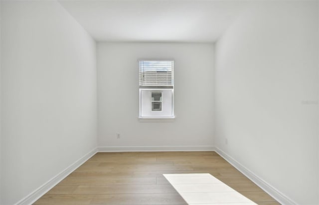 unfurnished room featuring light hardwood / wood-style flooring