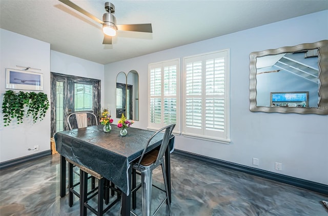 dining room featuring ceiling fan