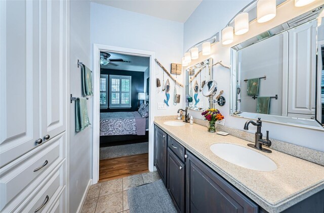 bathroom with vanity and tile patterned floors