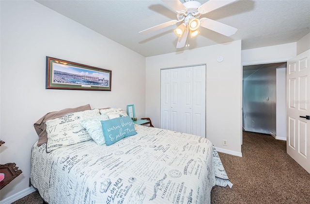 carpeted bedroom with ceiling fan and a closet