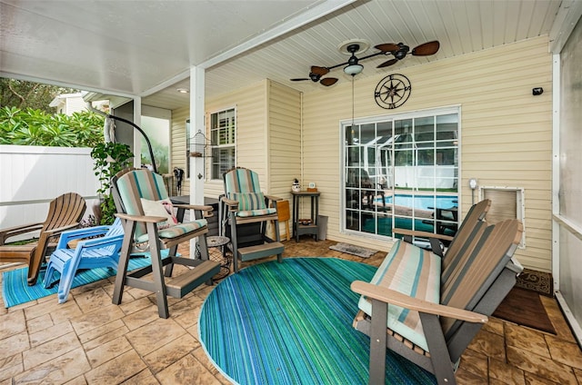 view of patio featuring ceiling fan