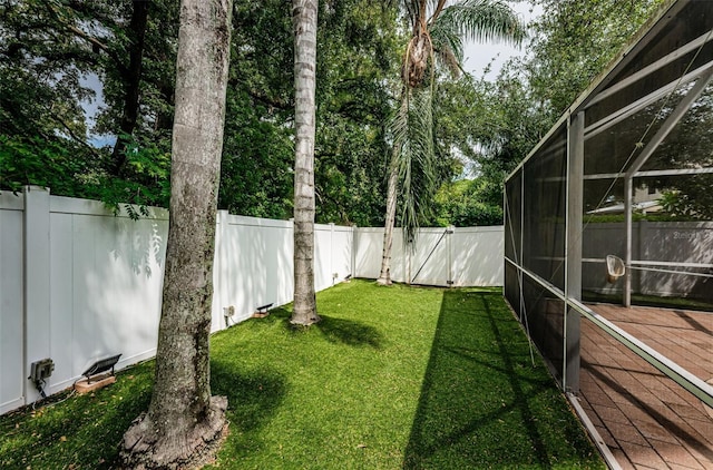 view of yard featuring a lanai