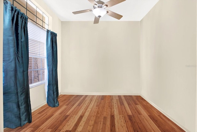 unfurnished room featuring ceiling fan and light wood-type flooring