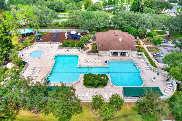 view of swimming pool featuring a patio area