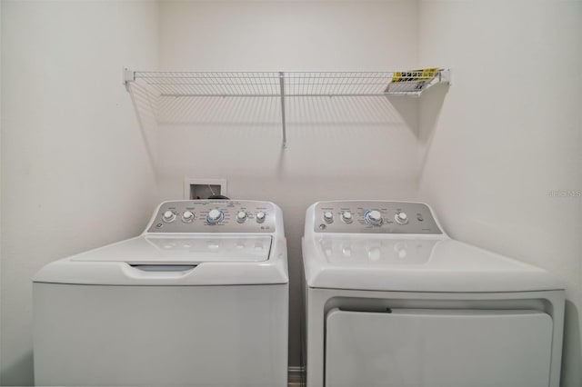 laundry area featuring washing machine and dryer