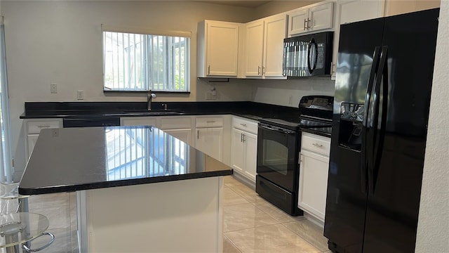 kitchen with sink, white cabinets, a center island, light tile patterned floors, and black appliances