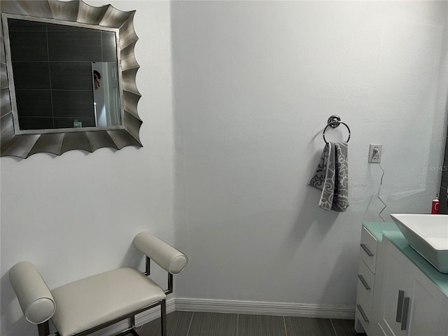 bathroom featuring vanity and hardwood / wood-style floors