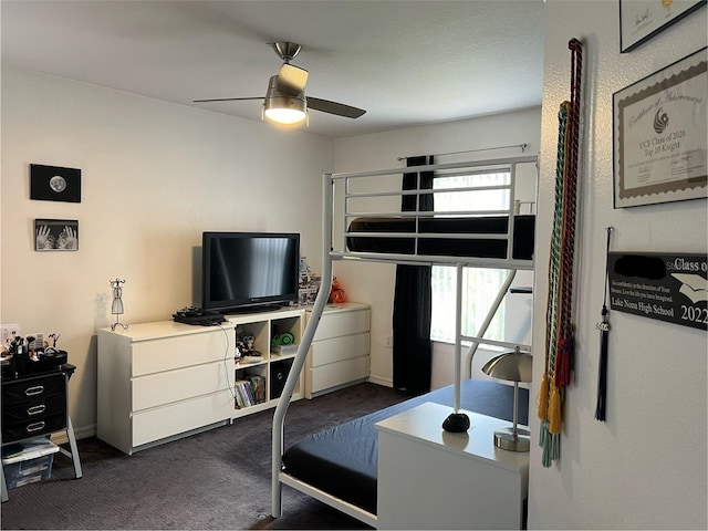 carpeted bedroom with ceiling fan