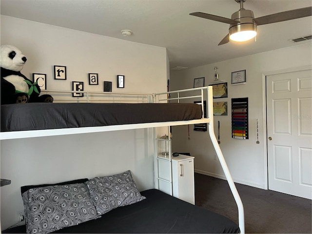 carpeted bedroom with ceiling fan