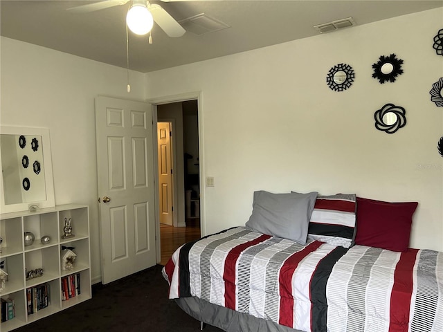 carpeted bedroom with ceiling fan