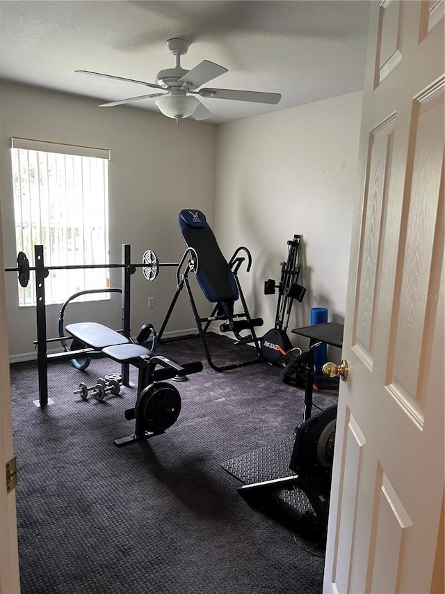 workout area with a textured ceiling