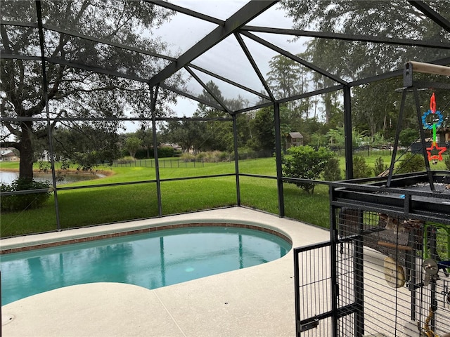 view of swimming pool with a yard, a lanai, and a patio