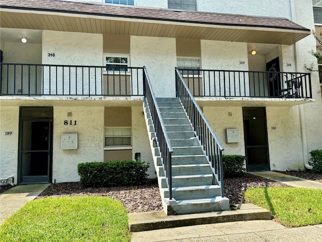 doorway to property featuring a balcony