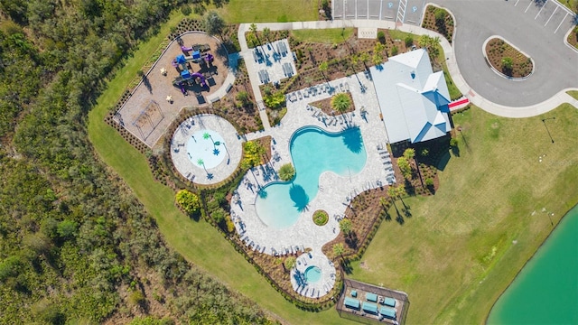 birds eye view of property featuring a water view