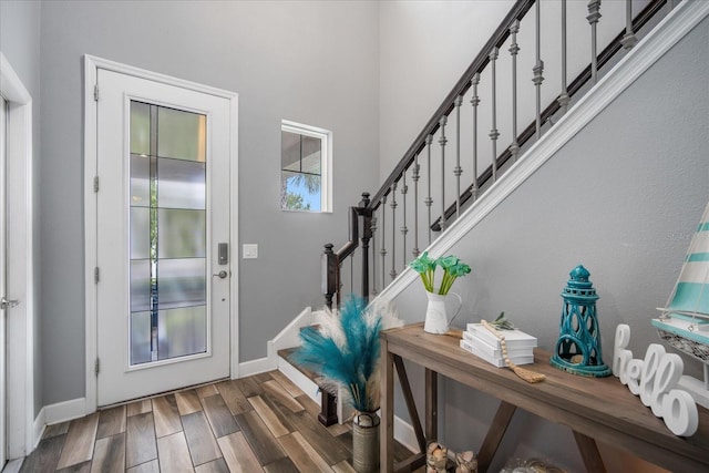 foyer entrance featuring hardwood / wood-style floors