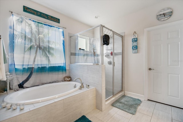 bathroom with plus walk in shower and tile patterned flooring