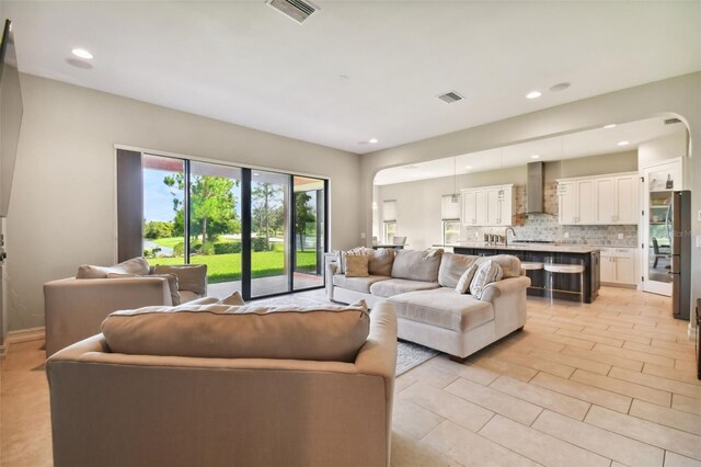 tiled living room with sink