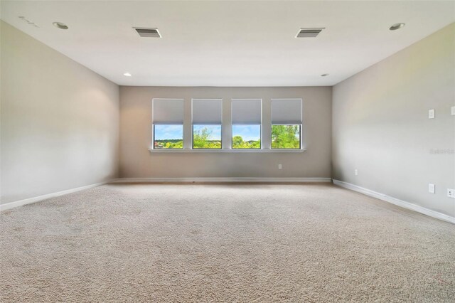 spare room with carpet flooring