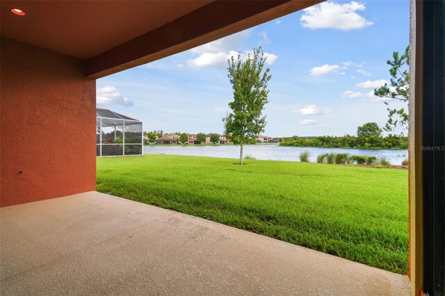 view of patio featuring a water view