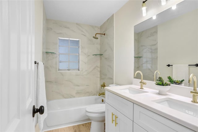 full bath featuring tub / shower combination, a sink, toilet, and double vanity