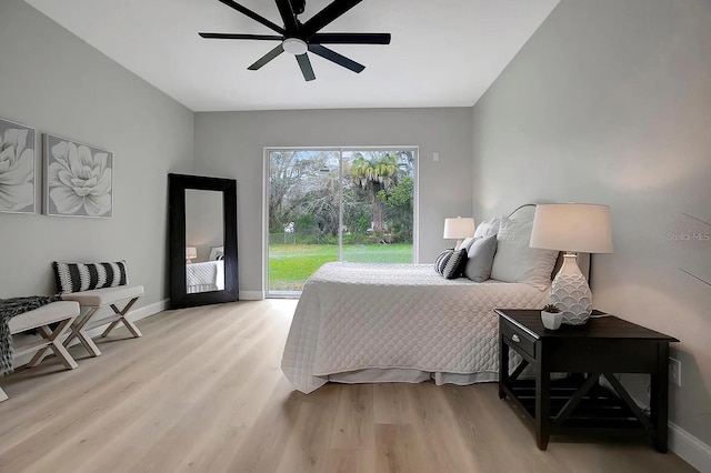 bedroom with ceiling fan and light hardwood / wood-style flooring