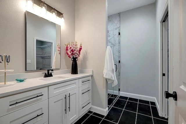 bathroom with tile patterned flooring and vanity