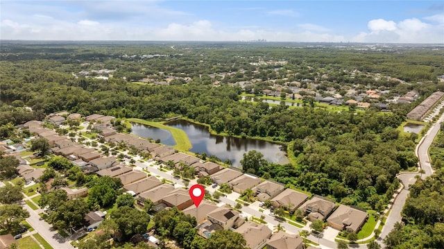 drone / aerial view with a water view