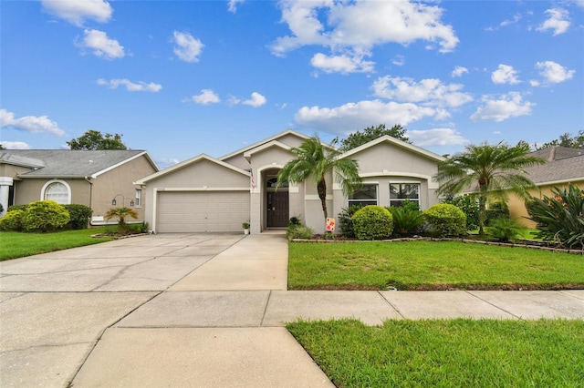 ranch-style house featuring a garage and a front yard