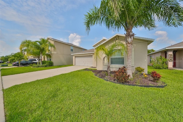 view of front of property with a garage and a front yard