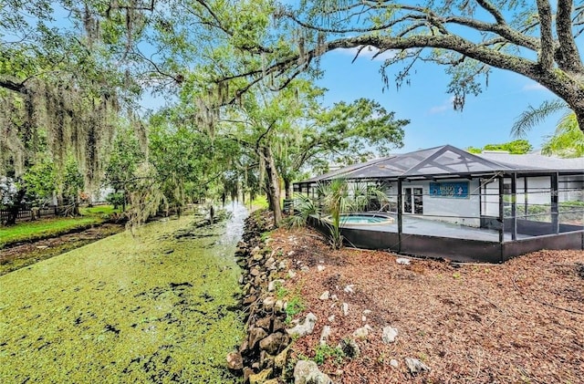 view of home's community with a swimming pool