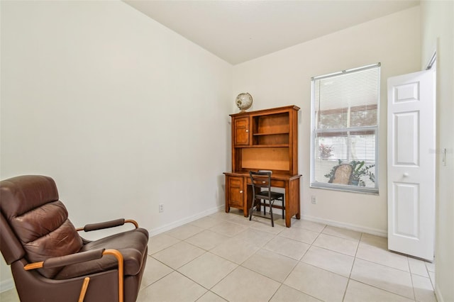 living area featuring light tile patterned floors