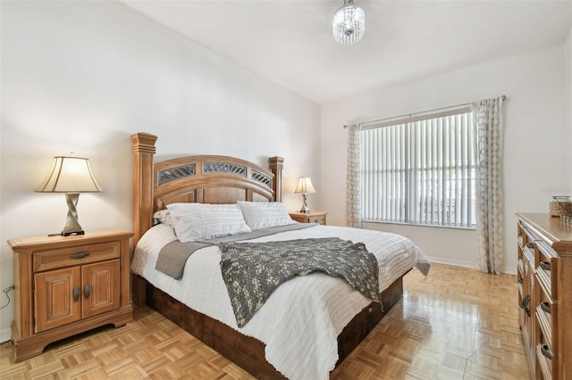 bedroom featuring baseboards