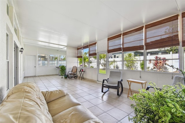 sunroom / solarium with tile patterned flooring