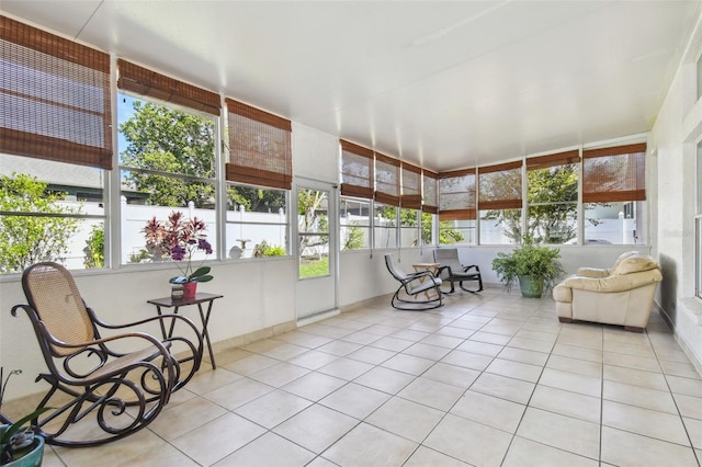 sunroom featuring tile patterned floors