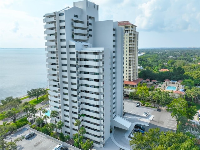 view of building exterior with a water view